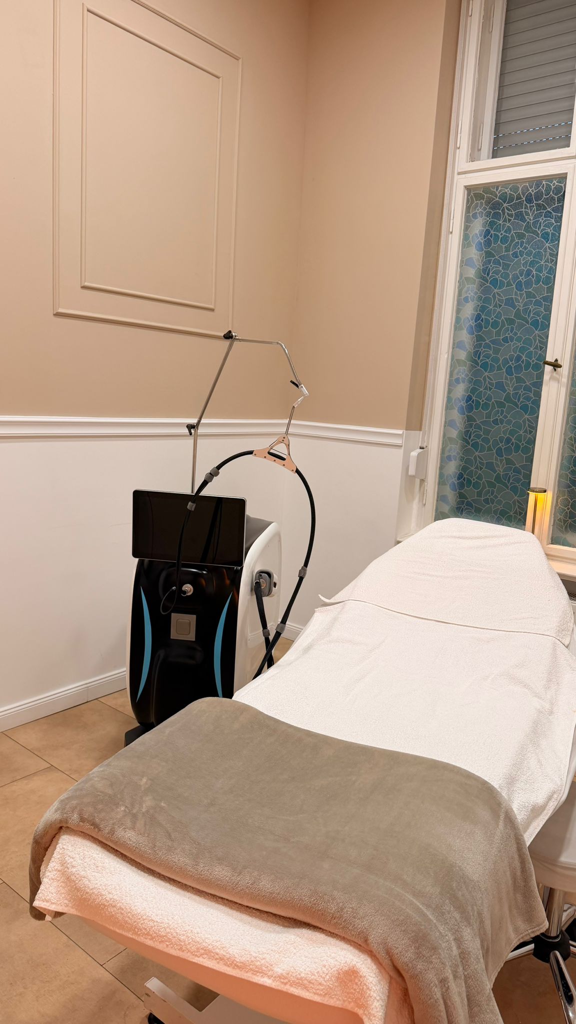 Soft lighting and furniture detail inside Myzila Cosmetics